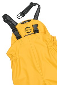 Overoles impermeables amarillos con tirantes y hebillas negras ajustables. Presentan una cintura elástica y un material liso y duradero. Etiqueta de la marca en el interior.