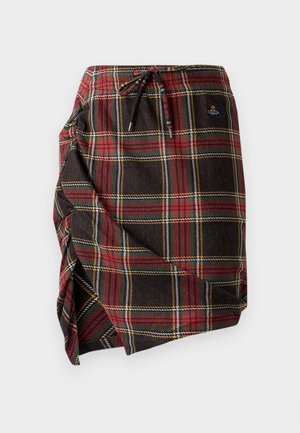 Károvaná zavinovacia sukňa z tmavého materiálu so vzormi v červenej, zelenej a žltej farbe. Obsahuje elastický pás so šnúrkou a detail postranného rozparku.