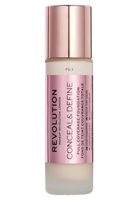 Fond de teint liquide dans un flacon en verre cylindrique avec une moitié inférieure givrée et un capuchon doré rose brillant. Étiquette en texte noir sur fond rose.