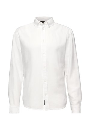 Bílá košile s dlouhým rukávem a knoflíkovým límečkem, předními knoflíky a strukturovanou tkaninou. Na boku je označení.