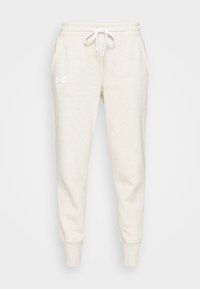 Lichtbeige sweatpants gemaakt van een zachte stof, met een elastische tailleband met trekkoord, zijzakken en elastische boeien bij de enkels.