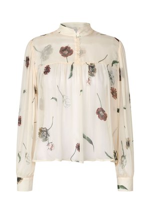 Camicia floreale con maniche lunghe, realizzata in leggero tessuto color crema. Presenta un collo alto, una patta con bottoni e vari motivi floreali in rilievo.