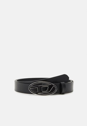 Black leather belt featuring a wide strap, an oval silver buckle with geometric design, and a smooth texture throughout.