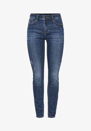 Dark blue denim skinny jeans with distressed detailing, a mid-rise waist, five pockets, and gold stitching on seams.