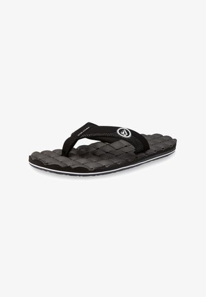 Black flip-flop with textured, cushioned sole, featuring black straps and a white accent line along the sole edge. Logo detail present.