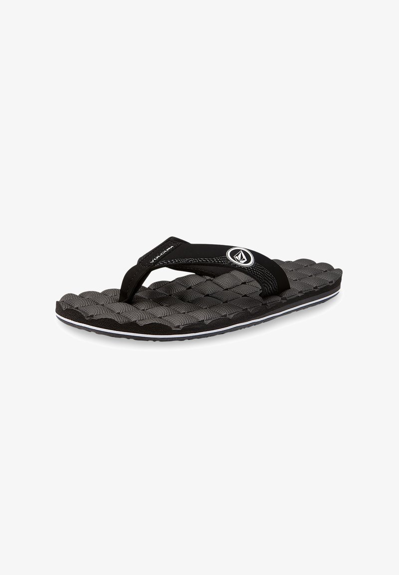 Black flip-flop with textured, cushioned sole, featuring black straps and a white accent line along the sole edge. Logo detail present.