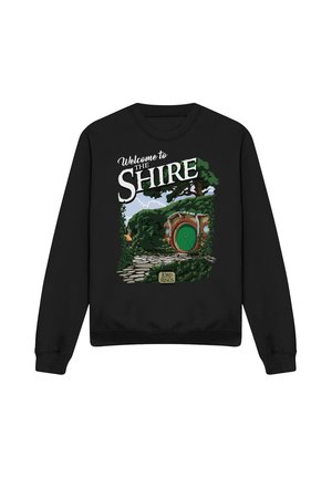 Black sweatshirt with a colorful hobbit hole and greenery design, text reads "Welcome to The Shire" and a small "Lord of the Rings" logo.