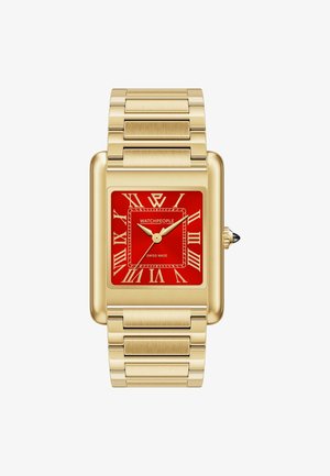 Zlatni pravokutni sat s crvenim brojčanikom, rimskim brojevima i srebrnim kazaljkama. Ima narukvicu od brušenog metalnog lanca. Švicarska proizvodnja.