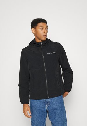 INSTITUTIONAL LOGO - Giacca a vento - black
