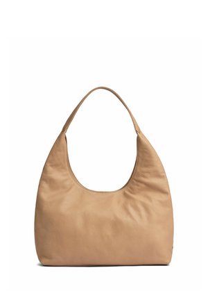 Tandakollase nahast õlakott, laia rihmaga ja pehmelt kujundatud ümar kuju, valgel taustal.