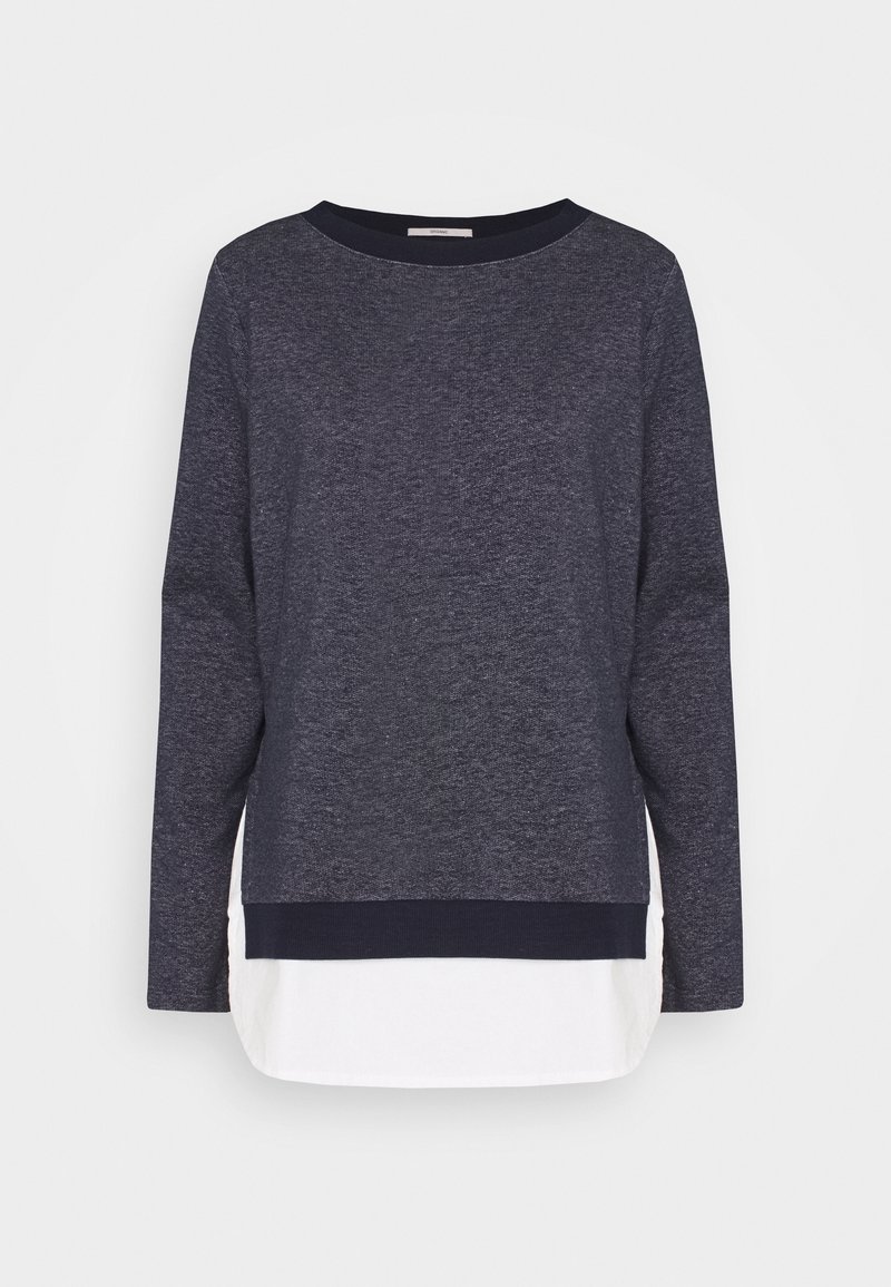 Pullover blu navy con maniche lunghe e scollatura a giro. Presenta un look a strati bianco all'orlo e un tessuto testurizzato.