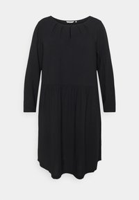 Abito lungo nero a maniche lunghe con scollo rotondo, caratterizzato da un davanti plissettato e una vita morbida e arricciata. Tessuto liscio, design al ginocchio.