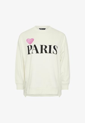 Hvid sweatshirts med sort tekst "PARIS" og et rosa hjerte-detail på den øverste venstre side. Har rund hals og sideslidser i kanten.