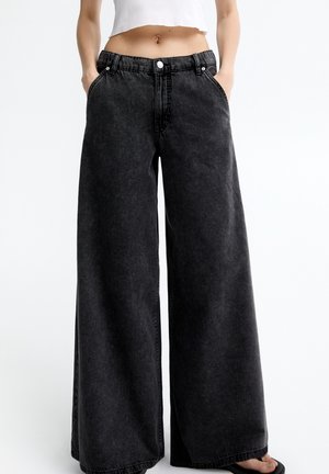 Vaqueros a campana - black
