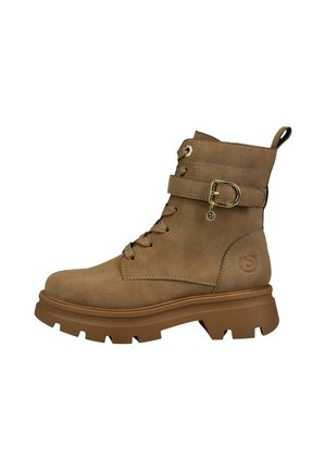 Brauner Wildleder-Schnürstiefel mit dicker Gummisohle, seitlichem Riemen mit goldener Schnalle und Zuglasche hinten.