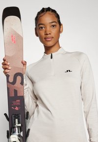 J.LINDEBERG Sports STEFFI MID LAYER - Sudadera - moonbeam