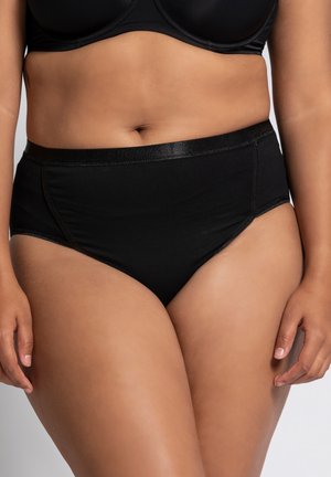 Slip neri in cotone a vita alta con elastico morbido in vita e cuciture laterali. Tessuto morbido, progettato per comfort e copertura totale.