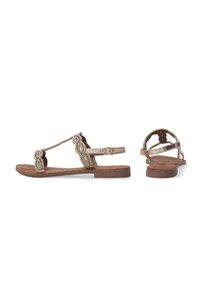Bruine platte sandalen met decoratieve kralen en een gevlochten bandontwerp. Verstelbare enkelband met een gladde, textuurrijke zool.