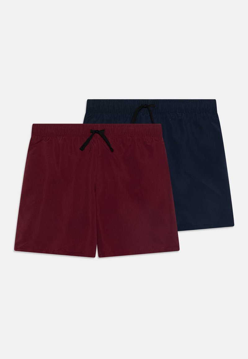Bañadores rojos y marinos hechos de una tela suave con cintura elástica y cordón negro, presentando un diseño simple y de color sólido.