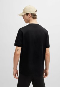HUGO DIRAGOLINO GEL - Basic T-shirt - black one
