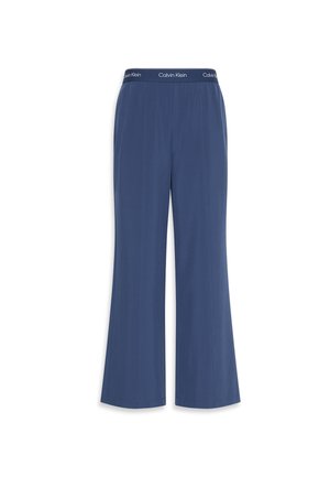 Calças largas na cor azul-marinho, feitas de um tecido suave com uma textura lisa. Apresenta uma cintura elástica com o logótipo "Calvin Klein" na parte superior.