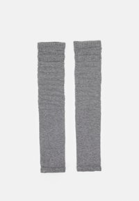 Graue Beinstulpen aus weichem Strickstoff. Gerippte Textur oben und unten mit geradem Design. Eignet sich gut zum Layering.