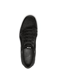 Black sneaker with a textured upper featuring leather and fur-like material, lace closure, and a white rubber sole. Branding on the tongue.