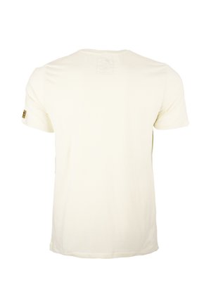 Cream-colored cotton t-shirt with short sleeves, round neckline, and a small patch on the left sleeve featuring brand logo. Plain back design.