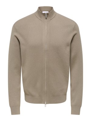 Pull beige à fermeture éclair avec un col montant, fabriqué en tissu texturé. Il présente des manches longues et un ourlet ajusté avec une fermeture éclair argentée.