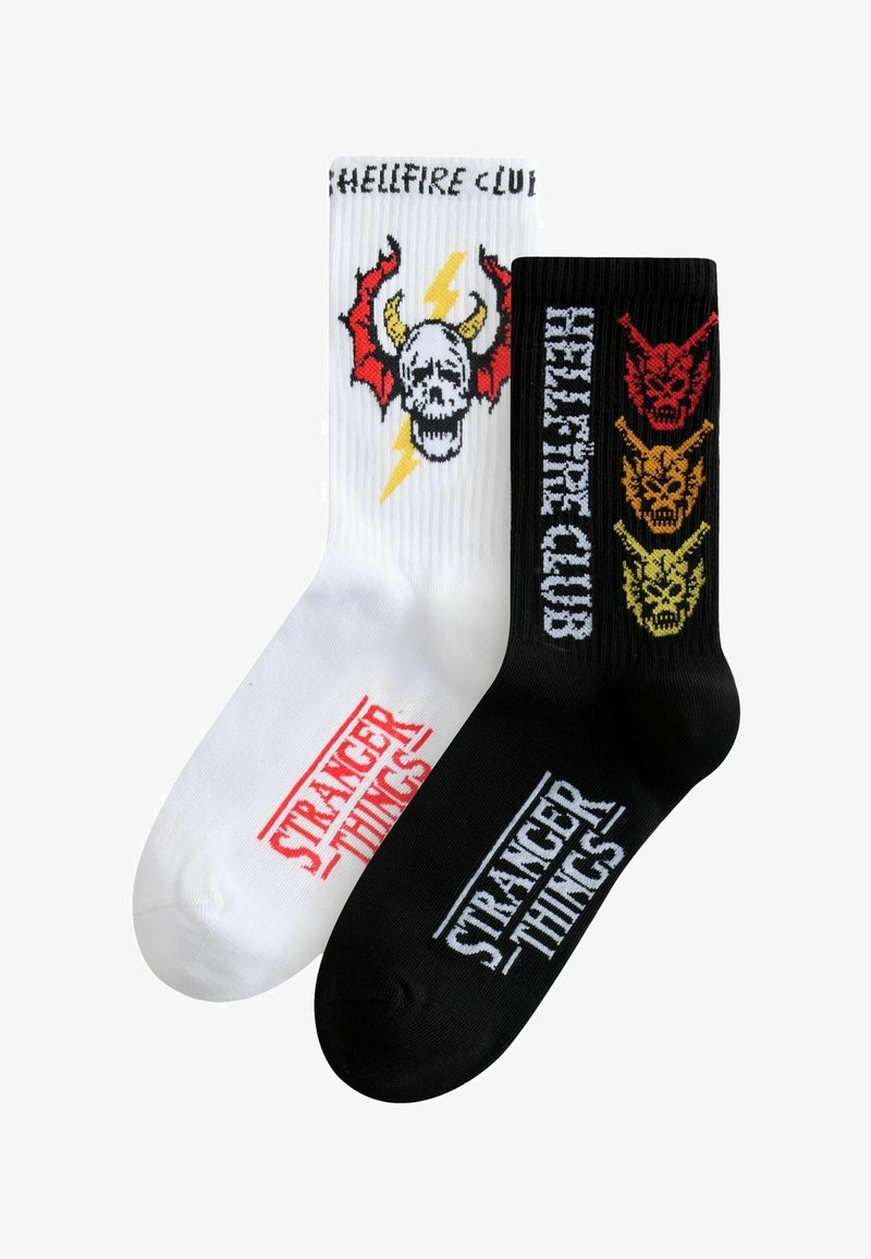 Sorte og hvide bomuldscrew-sokker med kranie- og dæmonmotiver, med "Stranger Things" og "Hellfire Club" trykt i kontrastfarver.