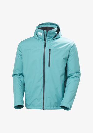 Veste imperméable bleu clair avec capuche, fermeture éclair frontale, poche poitrine zippée et logo Helly Hansen sur le col.