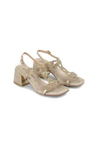 Beige haksandalen met blokhak, fonkelende rhinestone versieringen op de bandjes, gemaakt van nep suede materiaal en een gladde afwerking.