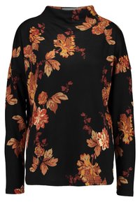 Czarny top z długim rękawem w kwiaty, z dużymi pomarańczowymi i kremowymi kwiatami oraz zielonymi liśćmi, z prążkowanym kołnierzem i luźnym krojem. Miękka struktura tkaniny.