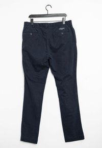 Navy blue trousers made of cotton, featuring a straight leg design, back pockets with button closures, and a waistband label for brand identification.