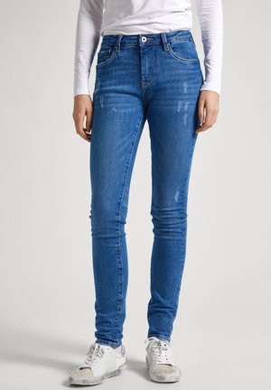 Kitsa lõikega teksad - blue denim
