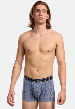 Marineblaue Boxershorts mit Blattmuster, aus weichem Material und einem schwarzen Bund mit "DIM"-Logo. Eng anliegendes Design mit mittellanger Beinlänge.