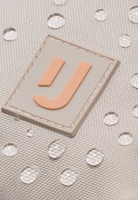 Johnny Urban JUNO - Telefontartó tok - sand