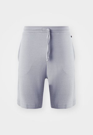 Lys grå bomullsshorts med snor i midjen, sidelommer og et teksturert ribbet mønster. Mid-thigh lengde.