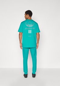 adidas Originals LIVERPOOL FC ICON TRACK PANT - Klub merchandise - sea green