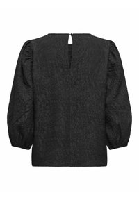Blusa nera in tessuto strutturato con maniche a sbuffo, schiena con apertura a chiave e scollatura rotonda. Tessuto liscio con un sottile dettaglio a motivo.