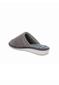 Zapatilla deslizante de pana gris con un exterior texturizado, interior suave y una suela de goma blanca. Presenta una punta redonda y costuras mínimas.