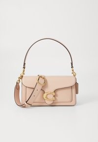Pink leather handbag with a fold-over flap, gold hardware, and a detachable shoulder strap. Notable C-shaped clasp detail on the front.
