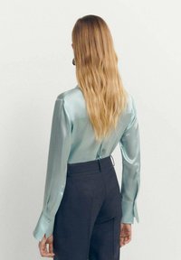 Mango Bluza s gumbima - light blue