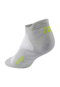 Calza corta grigia e bianca con una finitura testurizzata, caratterizzata da accenti verdi brillanti e logo, progettata per comfort e prestazioni.