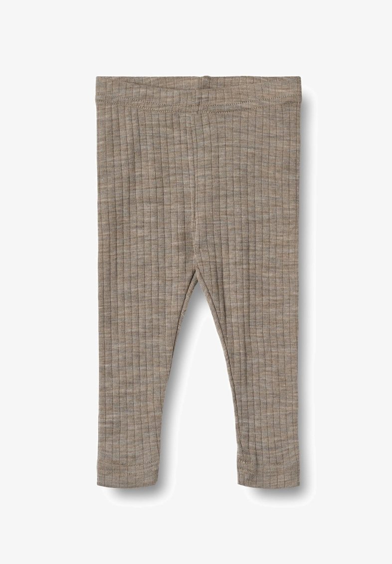 Leggings a coste realizzati in morbido tessuto beige. Presentano una vita elastica e gambe a sigaretta, con una texture sottile su tutta la superficie.