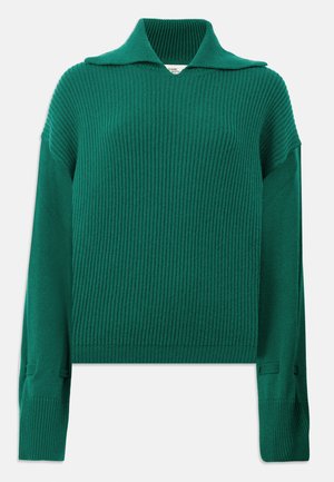 Green ribbed knit sweater with a wide collar, long sleeves, and side slits. Features a textured finish and relaxed fit.