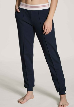 Marine joggers met een gladde textuur, een elastische tailleband met roze en witte strepen, zijzakken en aansluitende boorden bij de enkels.