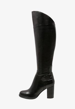 Black knee-high leather boot with block heel and decorative buckle strap on outer side.