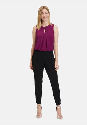 MIT CUT OUTS - Jumpsuit - patch black purple