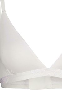 Soutien-gorge triangle blanc en tissu doux, avec un design épuré, des bretelles extensibles et une bande logotée scintillante en bas.